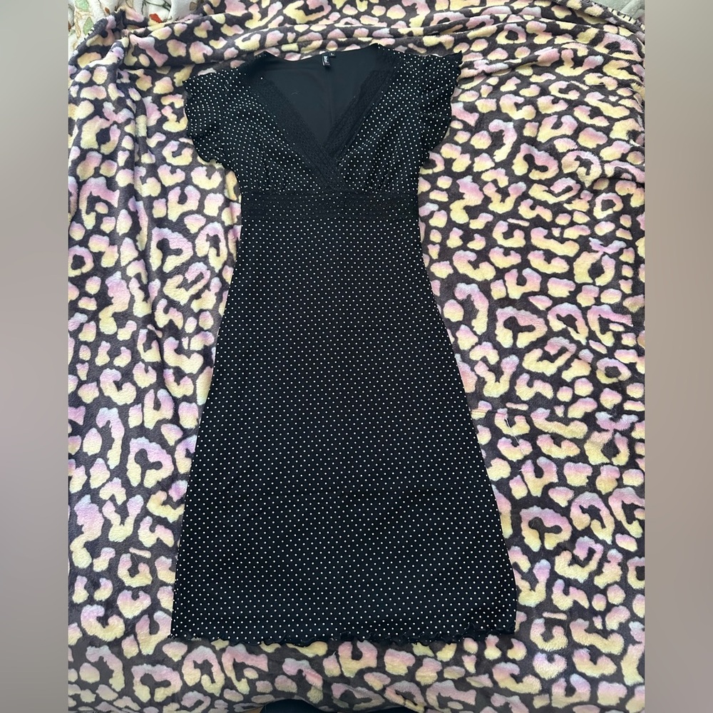 Charming black dress with white polka dots